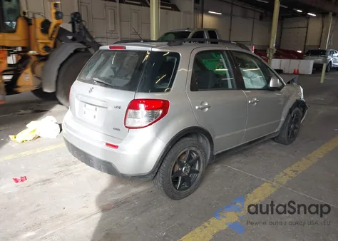 2010 Suzuki Sx4 Technology z USA, uszkodzony, nr VIN JS2YB5A39A6302670